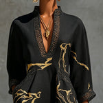 Léonie | Black Mini Dress in Crochet Lace with Gold Patterns and V-Neck